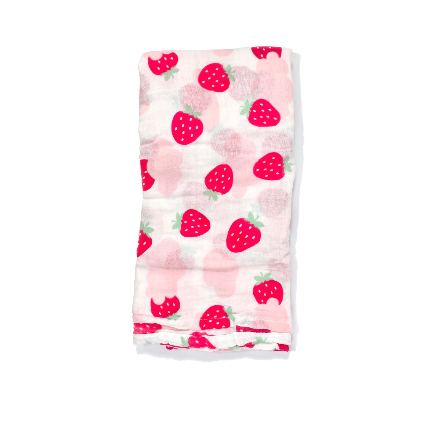 A muslin baby swaddle blanket made from bamboo and cotton fibres, in a pink strawberry design.