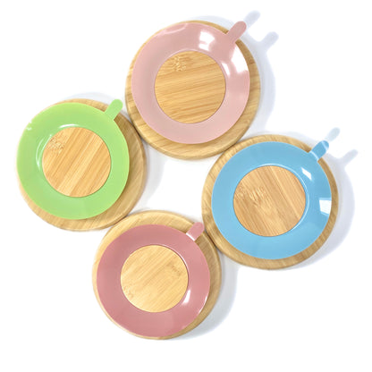 A set of children’s bamboo section plates with colourful silicone suction rings on the base. Back view, featuring the colourful silicone suction rings.