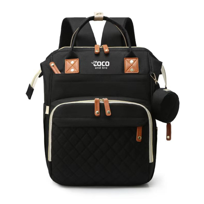 A black backpack for parents, featuring multiple storage solutions for all of baby’s essentials. Each backpack has multiple pockets, including a separate zipped compartment which is perfect for storing smaller items, such as dummies.