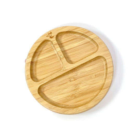 A children’s bamboo section plate with blossom pink silicone suction ring on the base.