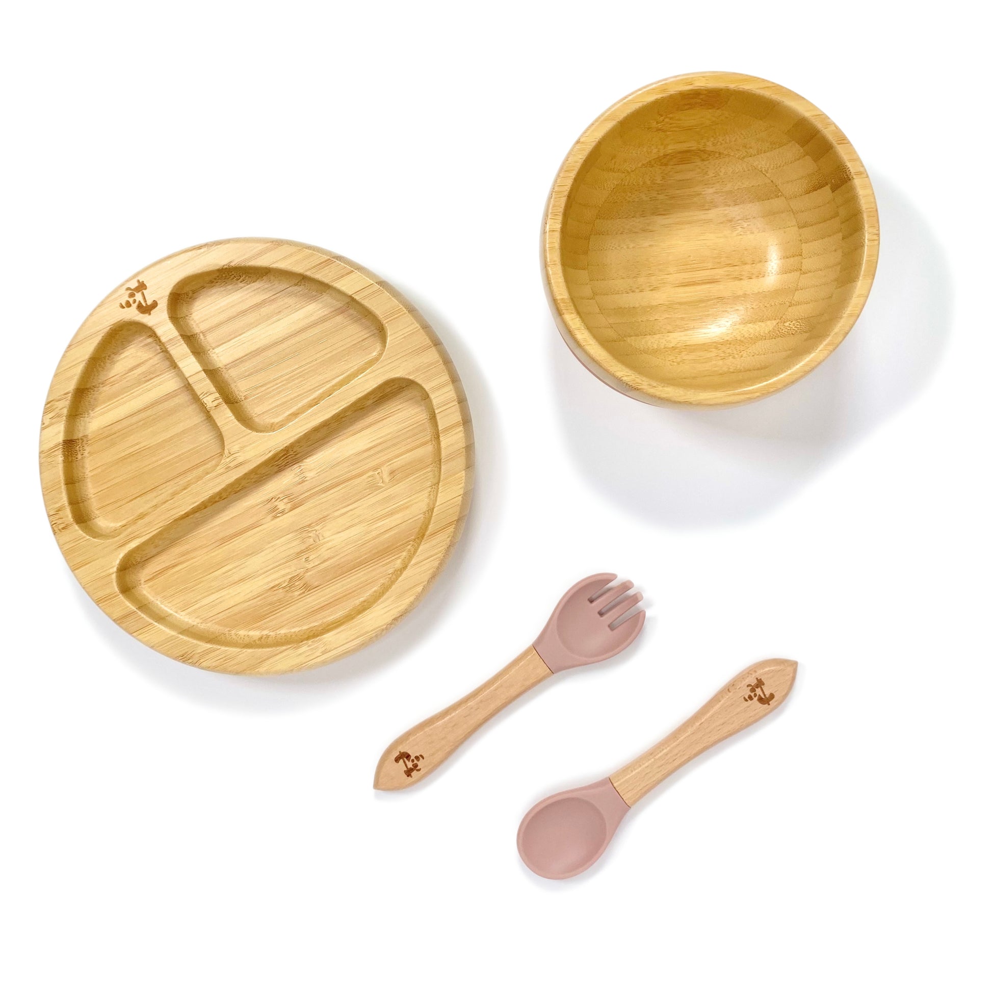 A children’s bamboo tableware set, including bamboo section plate with blossom pink silicone suction ring, bamboo bowl with blossom pink silicone suction ring and matching bamboo and silicone cutlery.