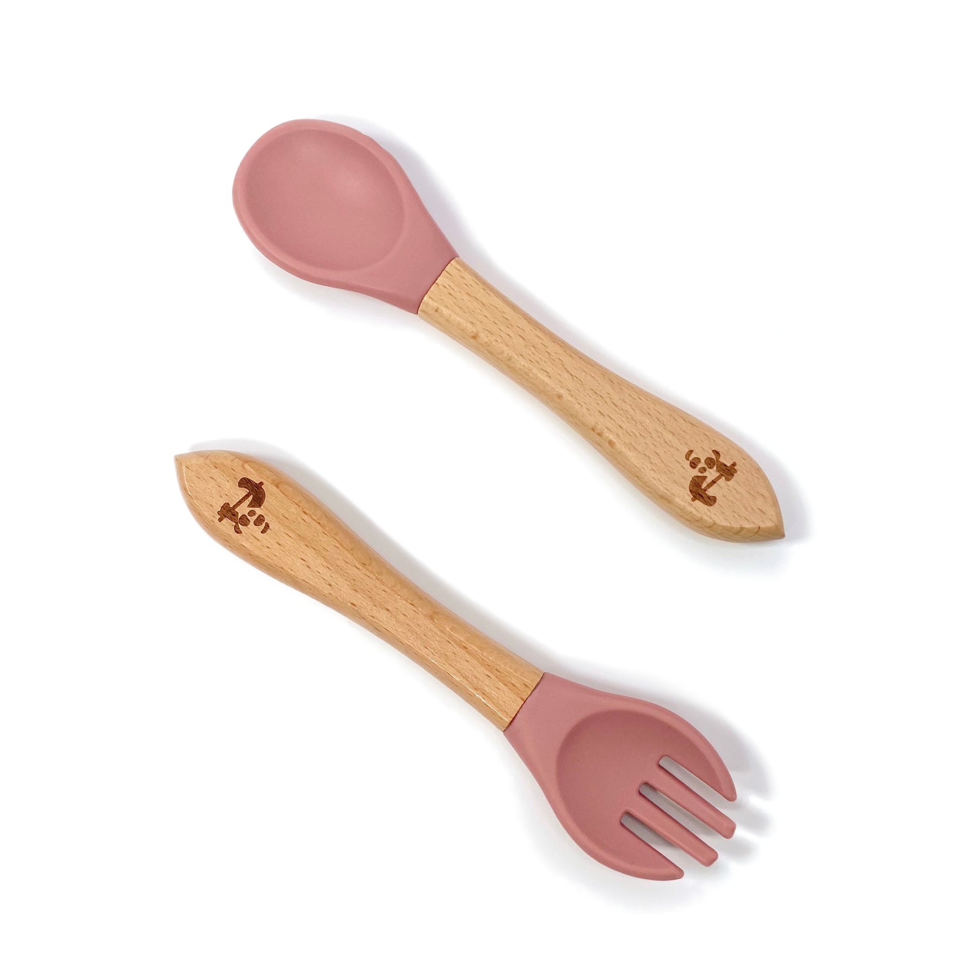 A set of children’s bamboo and silicone cutlery, in blush pink colour.