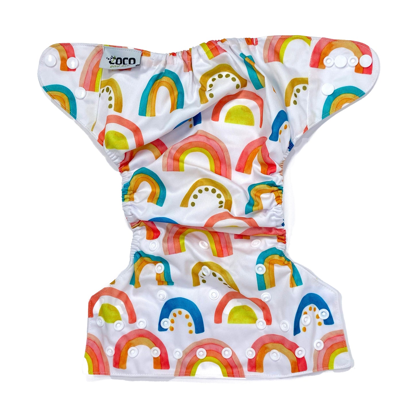 An adjustable reusable nappy for babies and toddlers, featuring a bright rainbow design, with brightly coloured rainbows on a white background. View shows the full outside pattern of the nappy, with fastenings open.