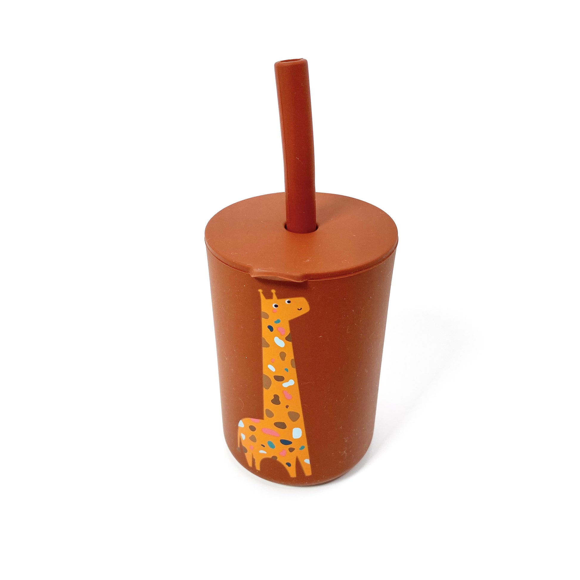 A children’s brown silicone drinking cup, with matching lid and straw, featuring a giraffe design. The image shows the cup with lid and straw attached.