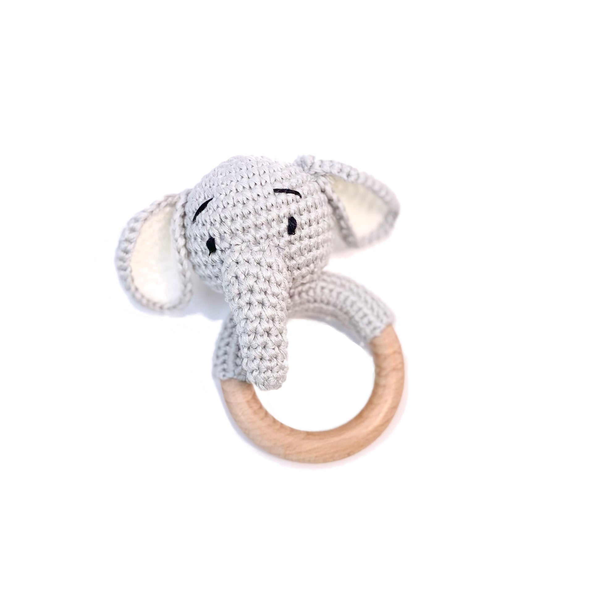 Baby rattle in an elephant design, made from wool and bamboo.