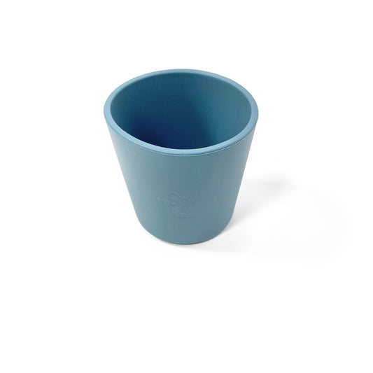 An ocean blue silicone children’s drinking cup.
