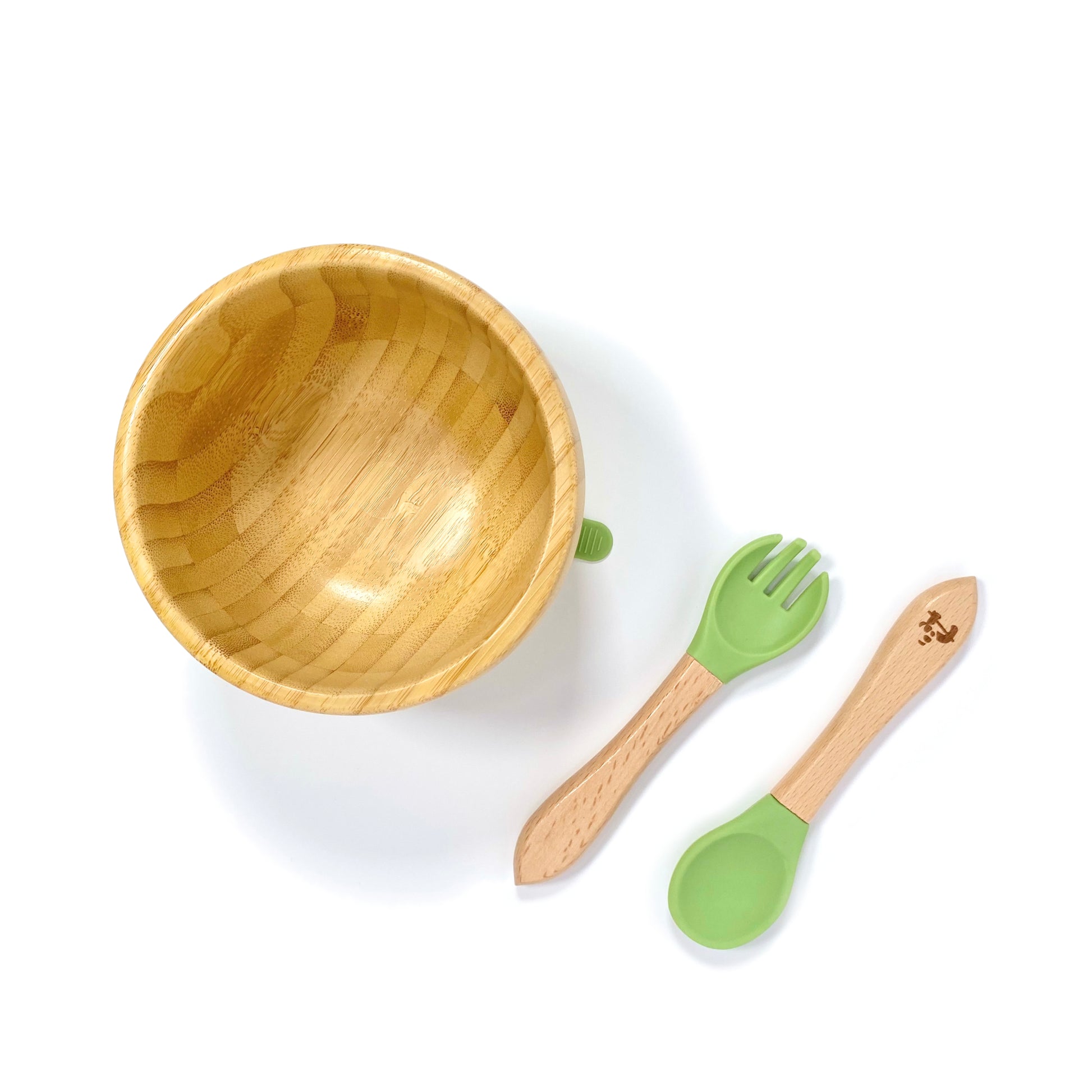 A children’s bamboo bowl with an olive green silicone suction ring, and matching olive green silicone and bamboo cutlery.