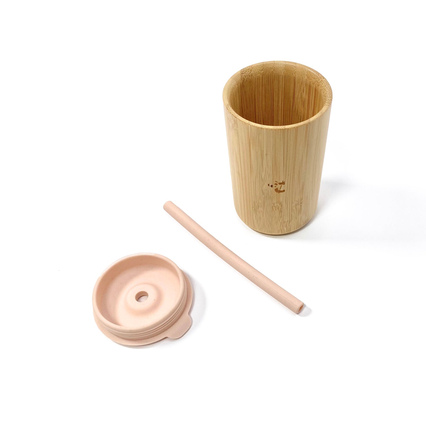 A children’s bamboo drinking cup, with a peachy pink silicone lid and matching straw. View shows the cup, lid and straw separately.