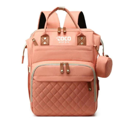 A peachy pink backpack for parents, featuring multiple storage solutions for all of baby’s essentials. Each backpack has multiple pockets, including a separate zipped compartment which is perfect for storing smaller items, such as dummies.