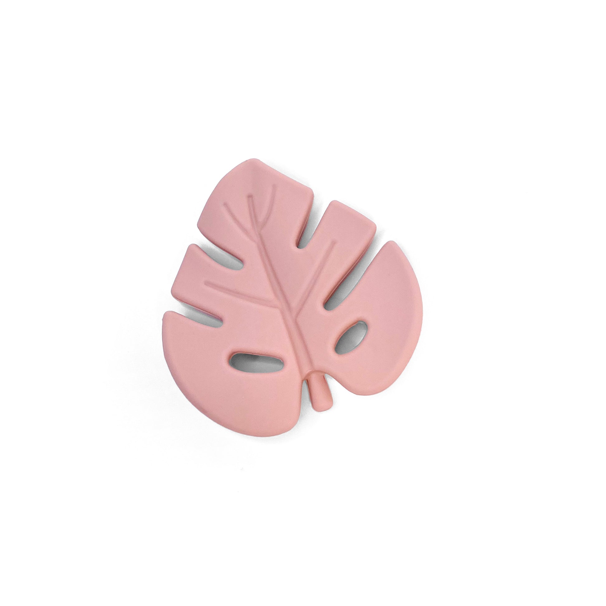 A children’s pink silicone teething toy, in a leaf design. 