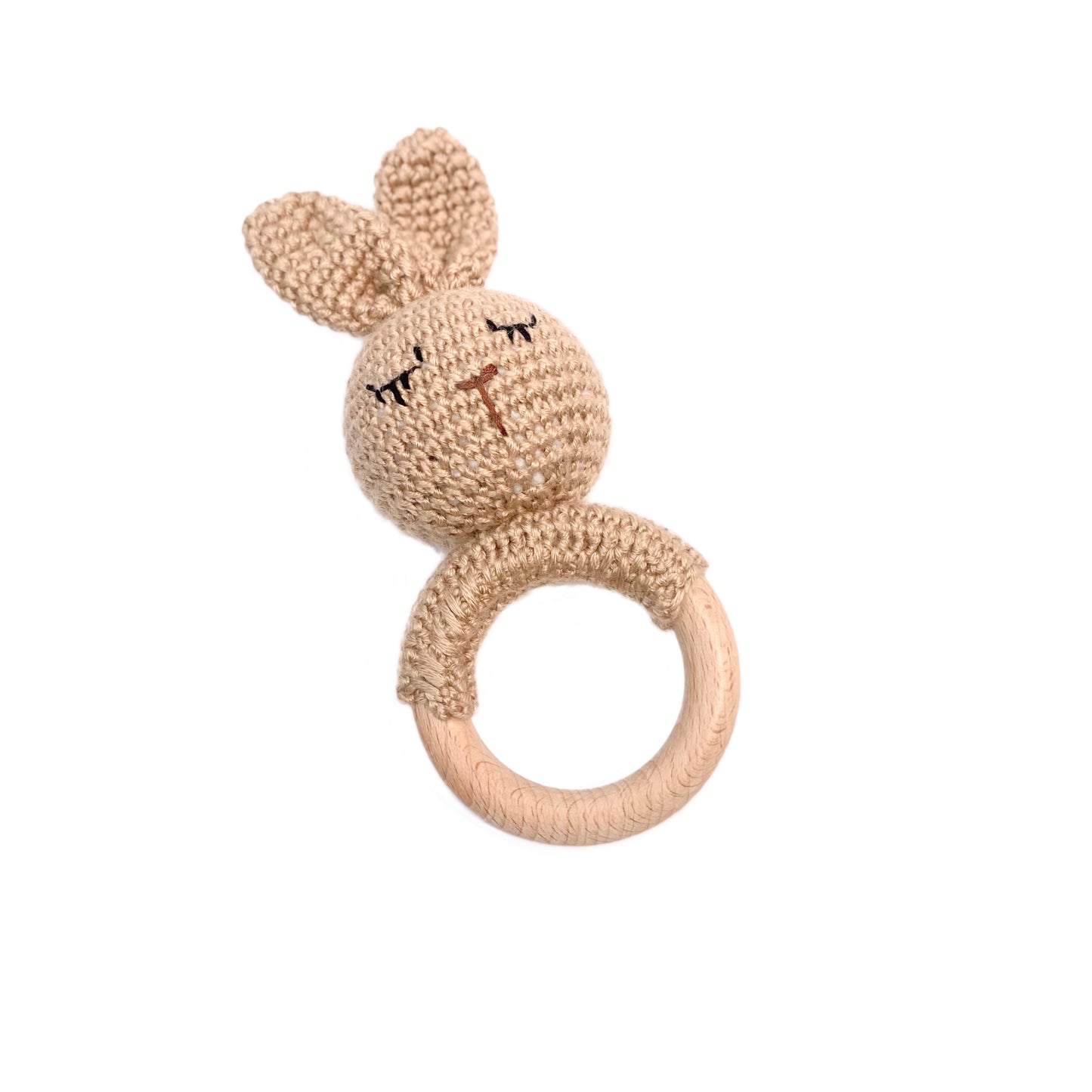 Baby rattle in a rabbit design, made from wool and bamboo.