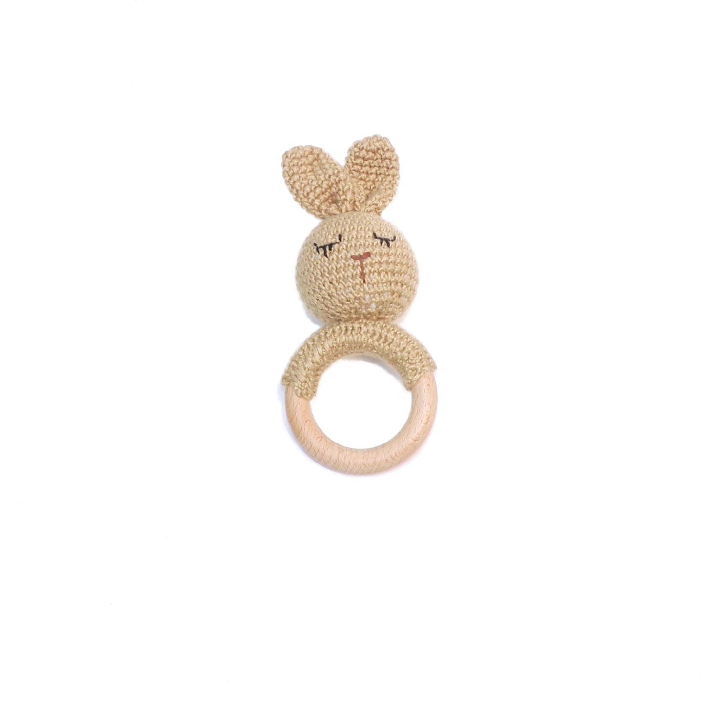 Baby rattle in a rabbit design, made from wool and bamboo.