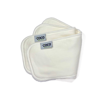 Image shows two nappy inserts made from a blend of two layers of luxuriously soft bamboo fibres and two layers of ultra-absorbent microfibre. Image shows the nappy inserts folded over as a pair.