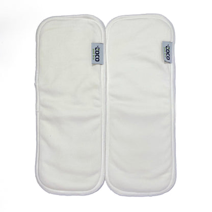 Image shows two nappy inserts made from a blend of two layers of luxuriously soft bamboo fibres and two layers of ultra-absorbent microfibre. Image shows the two nappy inserts side by side.