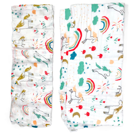 A set of two muslin baby blankets, one light swaddle blanket and one thick buggy blanket, with unicorn designs.