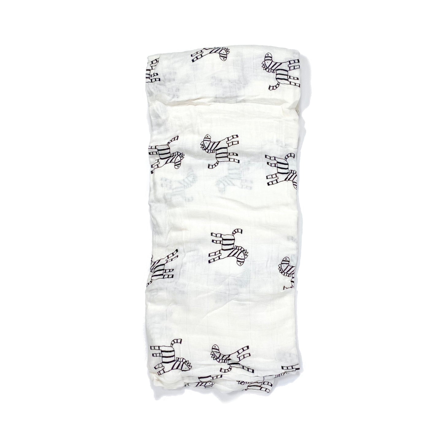A folded muslin swaddle blanket with a zebra design.