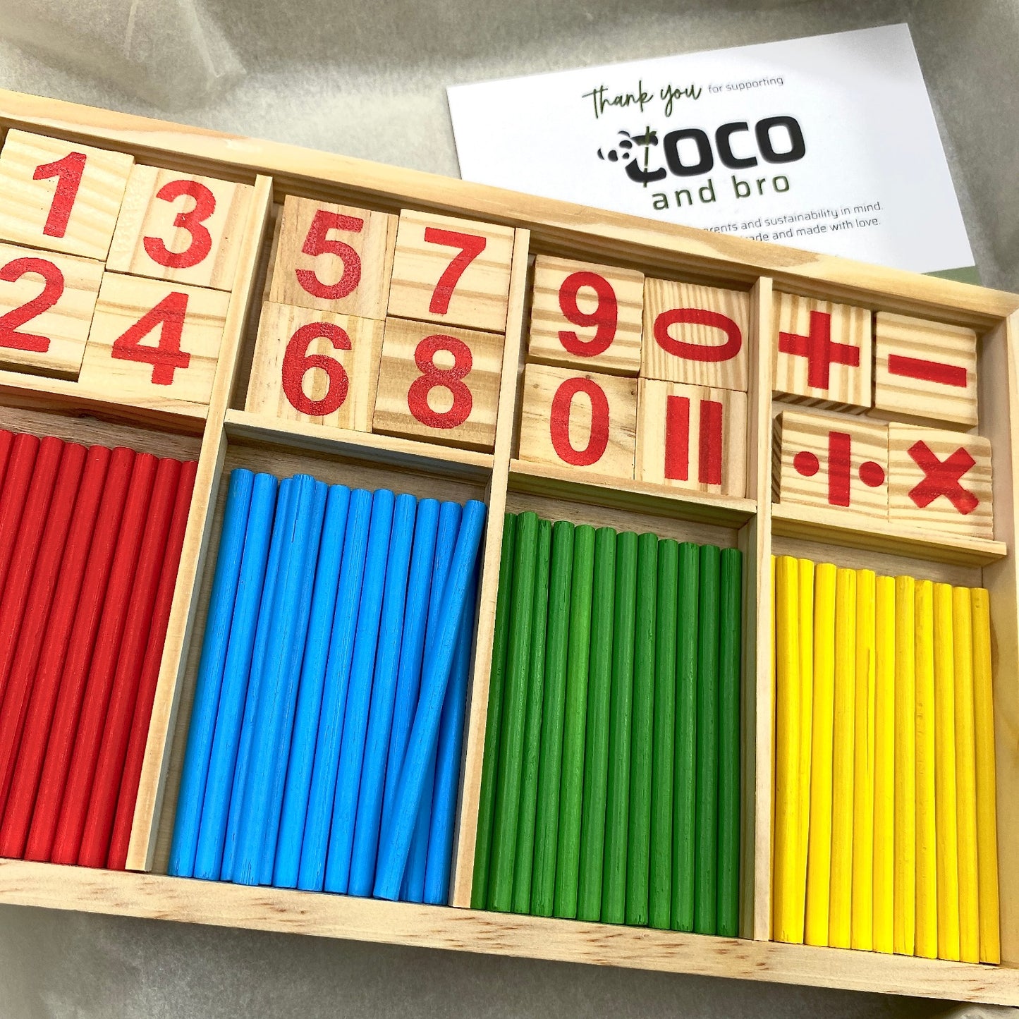 A children’s wooden counting toy to help children learn mathematics. The set features counting sticks, number tiles and mathematics symbols to improve mathematics skills.