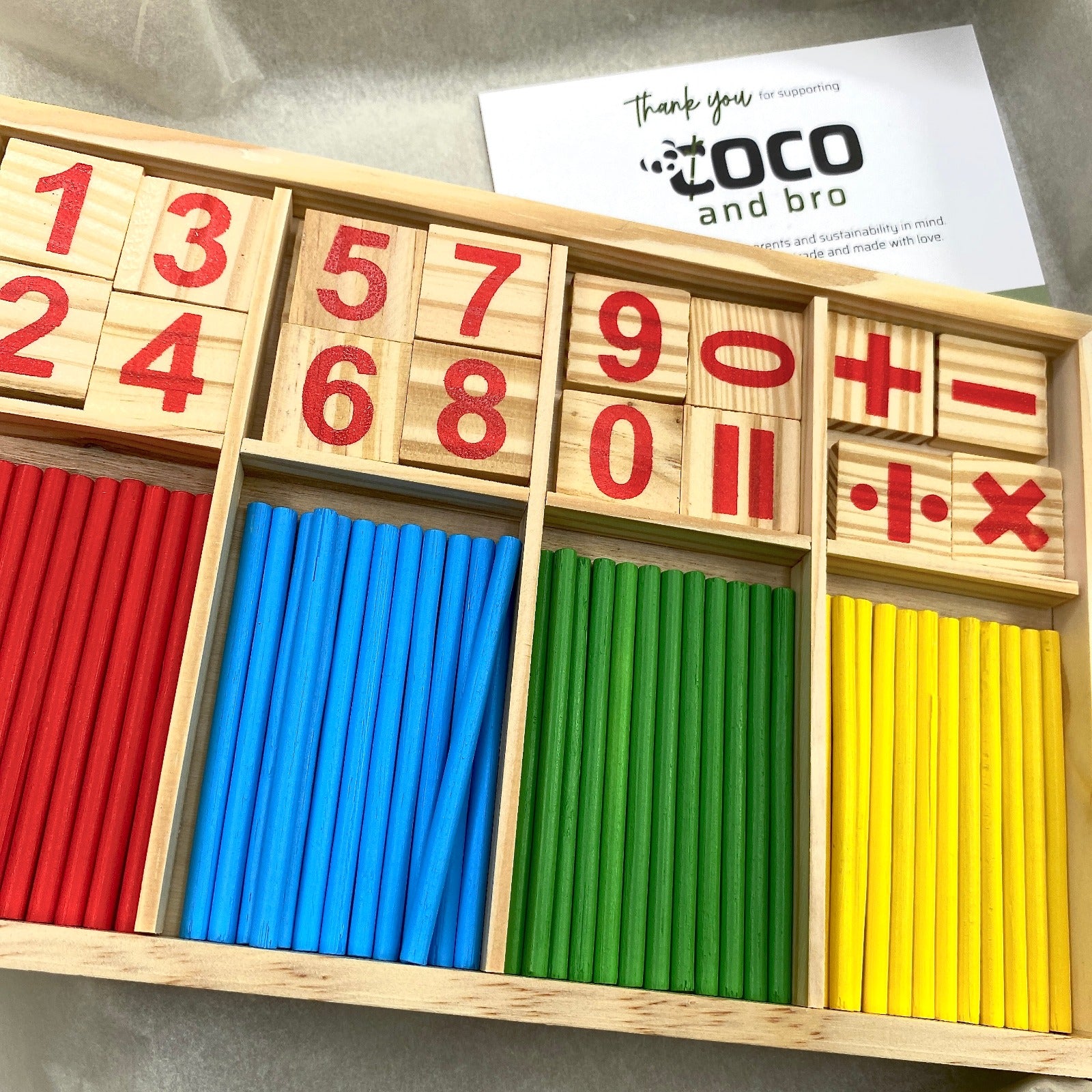 A children’s wooden counting toy to help children learn mathematics. The set features counting sticks, number tiles and mathematics symbols to improve mathematics skills.