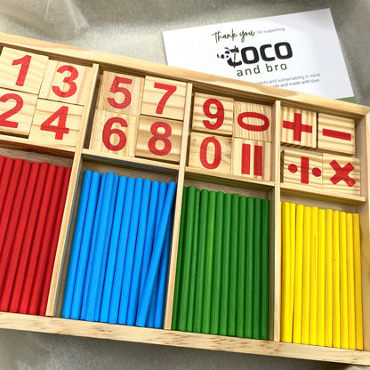 A children’s wooden counting toy to help children learn mathematics. The set features counting sticks, number tiles and mathematics symbols to improve mathematics skills.
