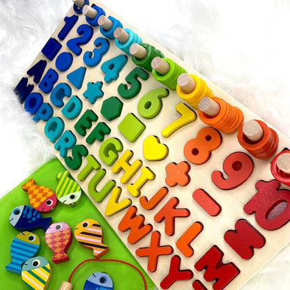 A multifunctional children’s wooden puzzle toy, featuring colourful shapes, numbers, counting rings and a magnetic fish game.