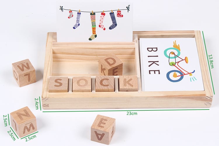 A children's wooden alphabet blocks spelling toy, with wooden letter blocks and spelling cards.